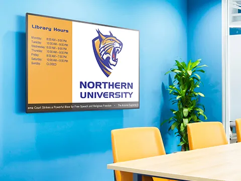 a digital display hanging on a wall
