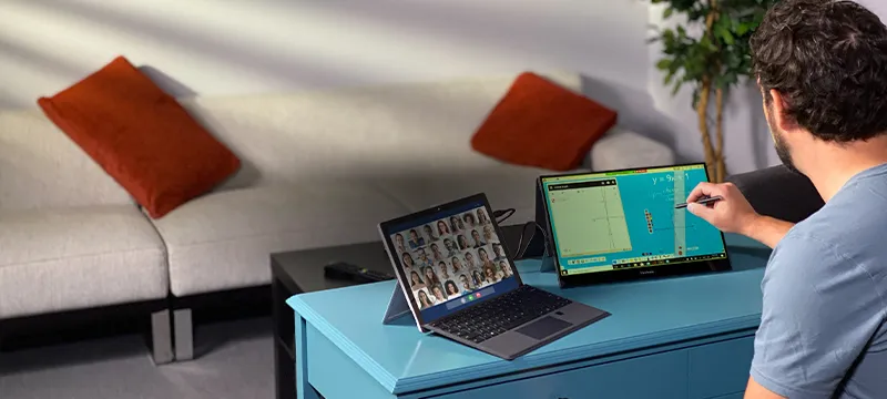 an ultrawide monitor on the desk in an executive office